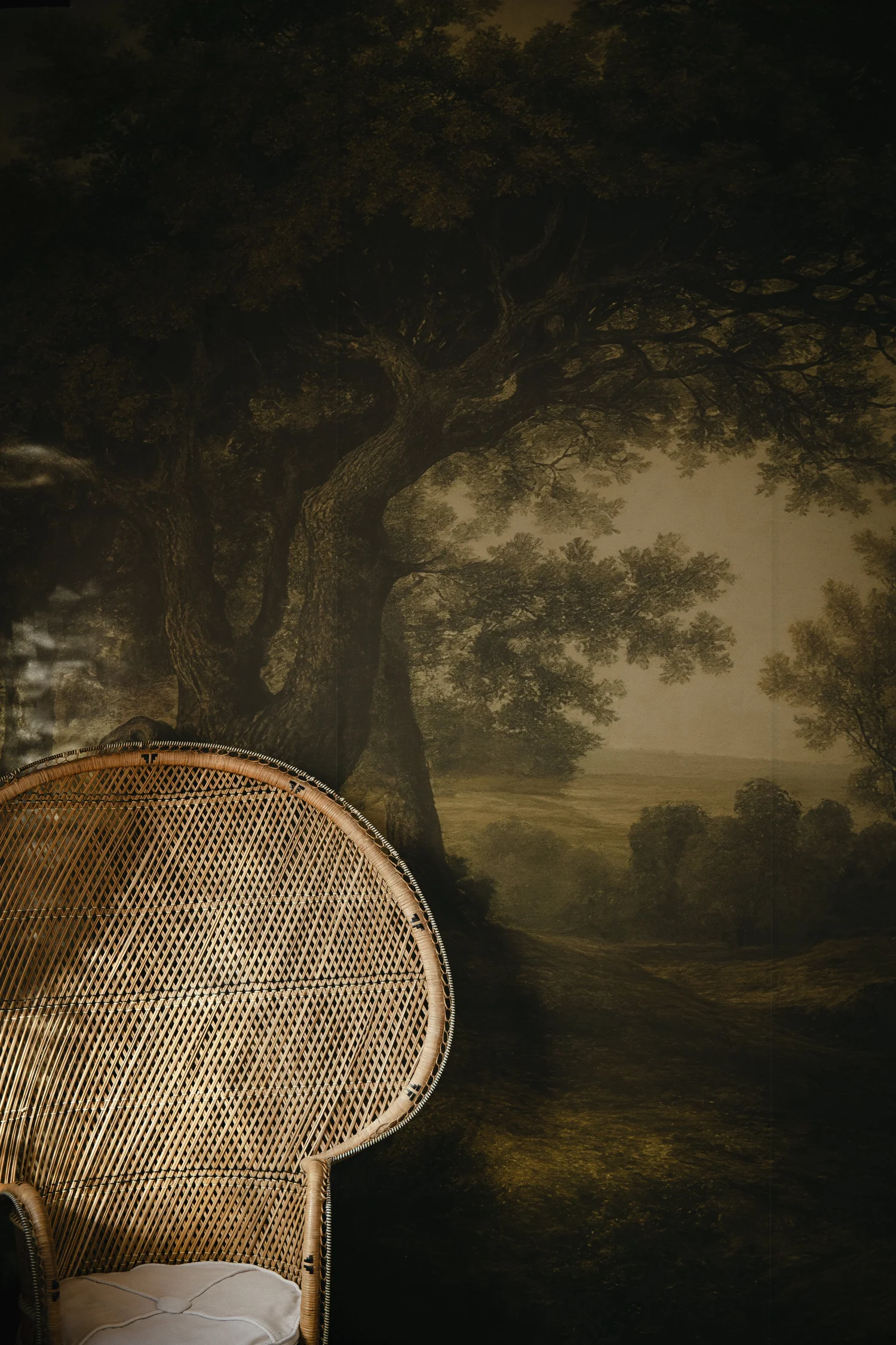 A wicker chair and woodland mural in my Great Baddow studio
